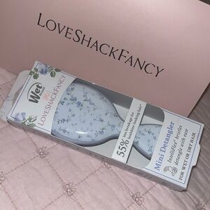 LoveShackFancy x Goody Wet Brush Mini Detangler.